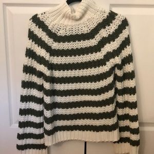 Green and white striped turtle neck sweater